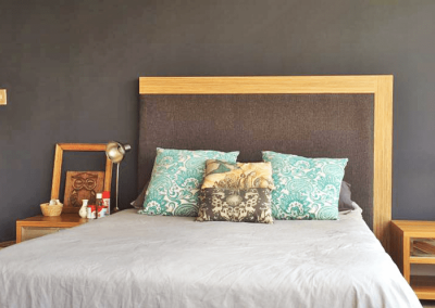 Bed with custom wooden headboard